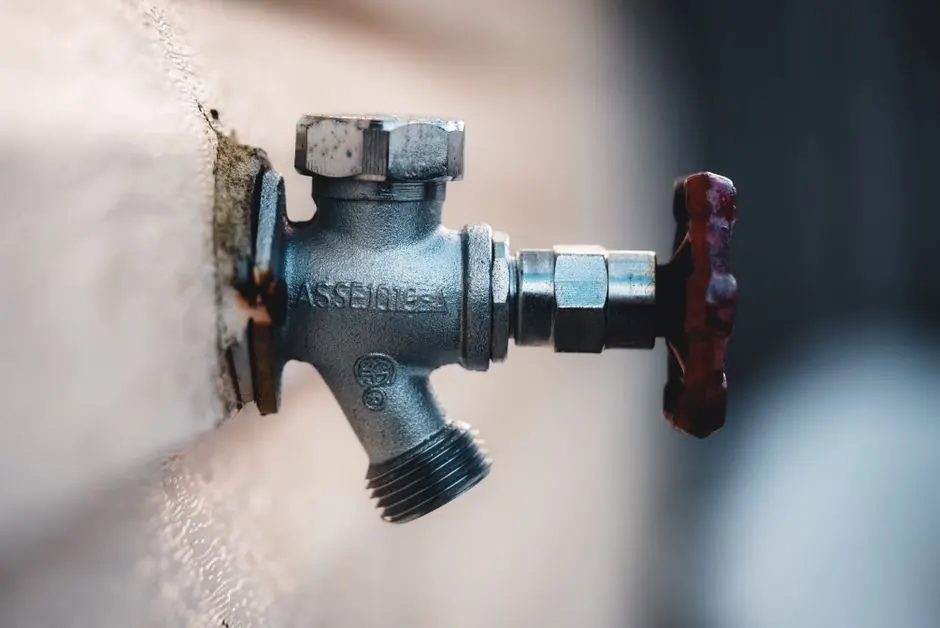 Hose bib shutoff valve on an exterior wall